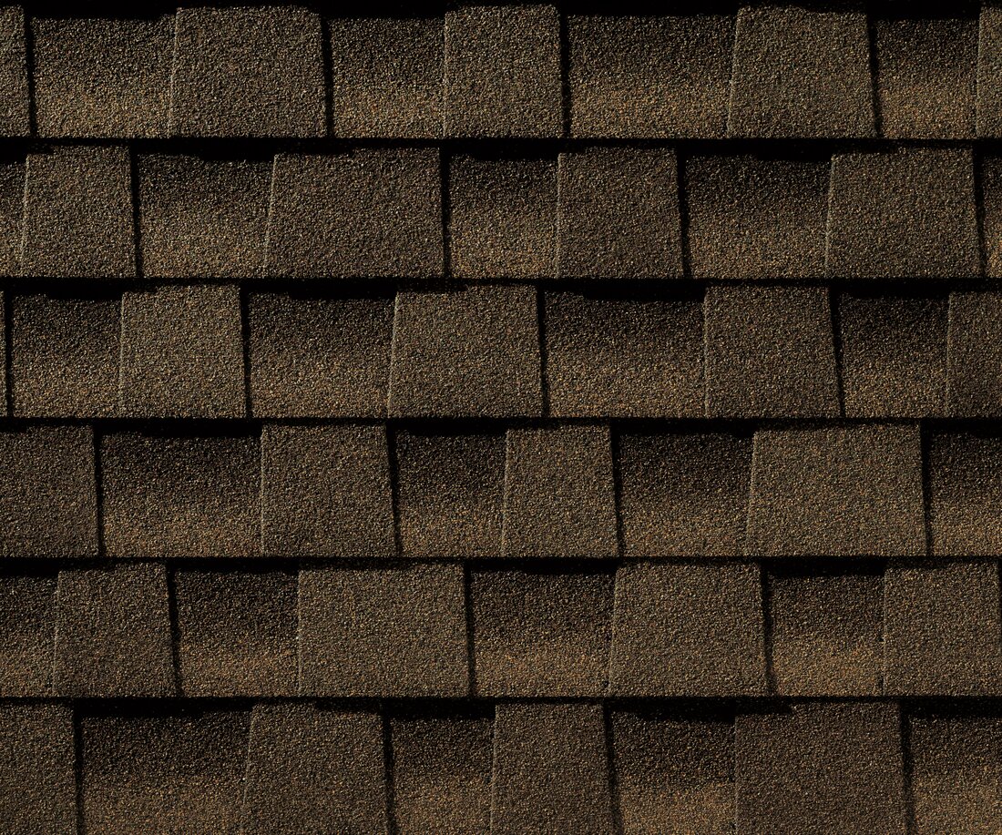 Close-up of GAF Timberline HDZ architectural asphalt shingles in Barkwood showing profile and texture